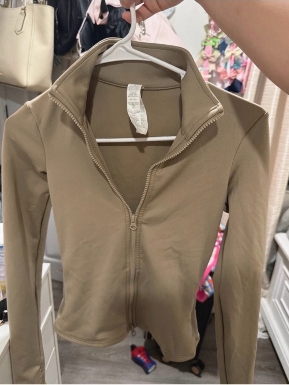 ALO Yoga Women's Zip-Up Jacket in Beige/Tan